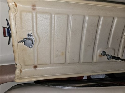 Underside of Glove Compartment Door with lock/latch assembly.